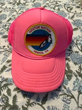 Aviator Nation Hot Pink Mesh Trucker Hat with Rainbow Logo Patch
